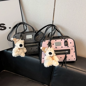 Polka dot Boston shoulder bags in pink and charcoal gray with cute plush bear charms