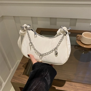White pleated half-moon shoulder bag with silver chain and pearl heart pendant