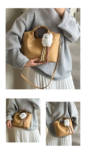 Detail of woven ginger bucket bag with cross-body strap and plush bear charm