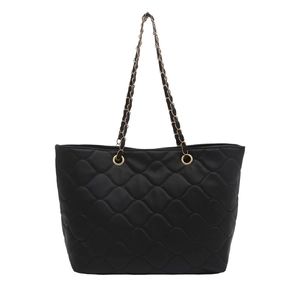 Chic black wave quilted tote bag with golden chain strap for women fashion