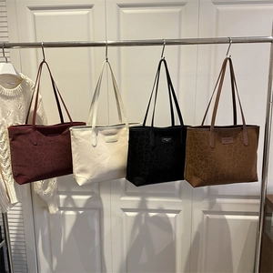 Leopard print faux suede tote bags in burgundy, cream, black, and brown leather styles