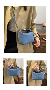 Detailed macro view of blue leopard print tote bag with gold metal hardware details