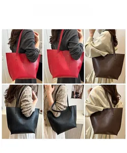 Detailed views of crocodile pattern tote bag in black, red, and brown showing shoulder wear