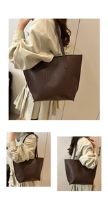 Detailed view of large dark brown tote bag with crocodile pattern and dual shoulder straps