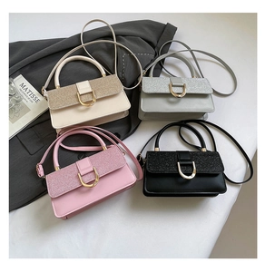 Detailed view of four elegant square crossbody bags in beige, grey, pink, and black colors
