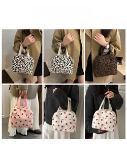 Collage of floral and leopard print corduroy lunch bags with zipper and strap detail