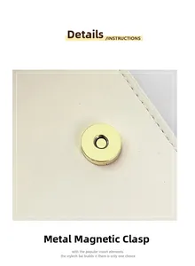 Detailed macro view of the light gold magnetic snap closure on a cream leather bag