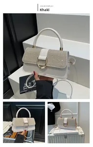 Detail of khaki square bag featuring glitter flap and golden D-shaped buckle closure