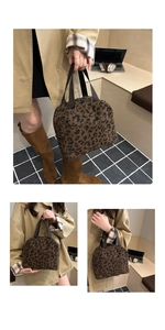 Close-up of leopard print corduroy lunch bag featuring durable brown webbing handles