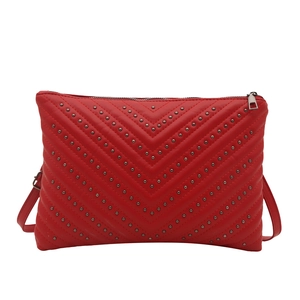 Elegant red V-quilted faux leather crossbody bag with silver rivet bead embellishments