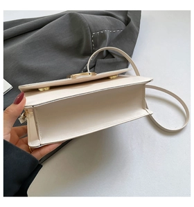 Detailed interior view showing double compartments of apricot PU leather shoulder bag