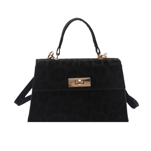 Vintage black leopard print handbag with a gold twist lock and structured top handle