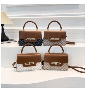 Detailed display of four retro crossbody bags with elegant canvas patterns and gold clasps