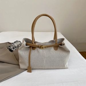 Retro large beige fabric tote bag with brown leather handles and gold metal buckles