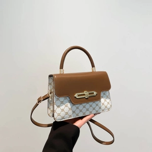 Retro vintage leather patchwork crossbody bag with classic pattern and gold buckle