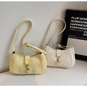 Détails de sacs sous les aisselles vintage avec boucles en métal en jaune et beige
