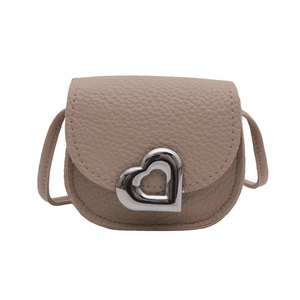 Mini lychee texture crossbody bag with silver heart metal clasp in dry rose pink finish
