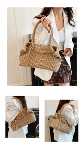Detail of brown textured teddy fleece tote bag showing leather straps and soft material