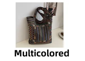 Detailed view of large ethnic pattern tote bag with woven geometric tapestry texture