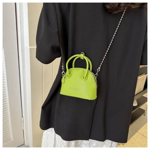 Fluorescent green mini shell bag featuring lychee texture and silver bead chain strap