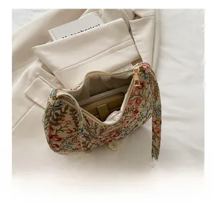 Internal view of vintage linen shoulder bag with floral embroidery showing large capacity