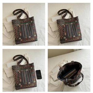 Detail view of large bohemian canvas tote bag showing interior capacity and geometric weave