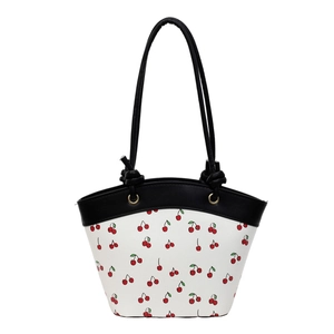 Minimalist white crossbody bag with cherry prints and black handles for women