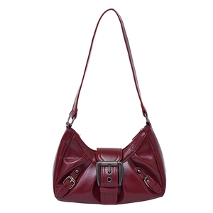 Minimalist glossy burgundy shoulder bag with vintage metal buckle and curved design