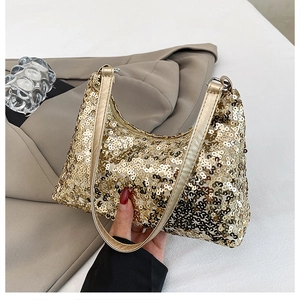 Detailed close-up of golden sequin hobo bag showing sparkling texture and hobo shape