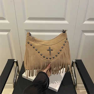 Camel faux suede crossbody bag with vintage rivets, tassel fringe and cross metal buckle