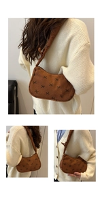Close-up of brown corduroy hobo bag with black bow patterns and textured vertical stripes