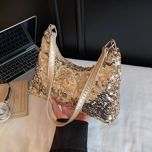 Chic gold sequin baguette bag with leather strap for party and evening wear fashion