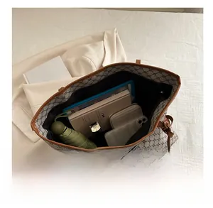 Detailed view of large tote bag interior showcasing ample storage for daily essentials