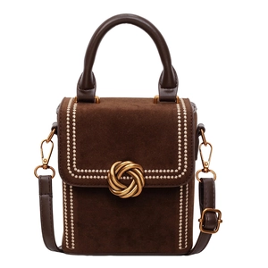 Vintage brown suede handbag with white embroidery and golden twist lock detail