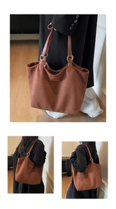 Detailed views of vintage brown suede tote bag with golden hardware and long straps