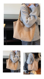 Detailed view of brown suede-like tote bag with thin leather straps and metal bar accent