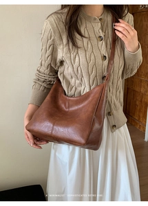 Deep brown retro soft PU leather hobo bag with minimalist stitch details on shoulder