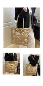 Gros plan sur un sac cabas matelassé doré métallisé avec texture brillante et chic