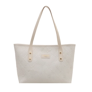 Minimalist beige tote bag featuring delicate bow embroidery and jacquard texture