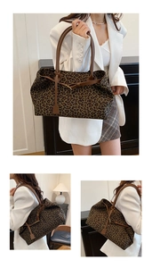Detailed side view of leopard print tote bag with premium brown leather strap