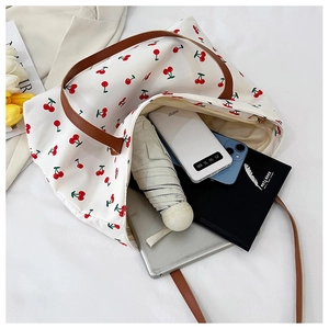 Top view of cherry print tote bag interior showing spacious capacity for daily essentials