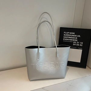 Borsa tote argento metallizzato ad alta capacità con scritte a rilievo per il pendolare