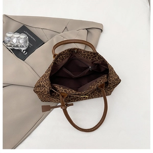 Internal structure of large leopard print tote bag with zipper pocket and brown lining