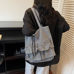 Fashionable black and white gingham tote bag with ruffle details and large capacity