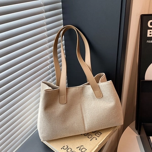 Borsa tote retrò in tela albicocca con manici in pelle in luce minimalista