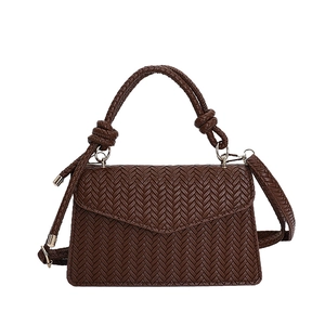 Dark brown woven leather handbag with vintage rectangular shape and top handle