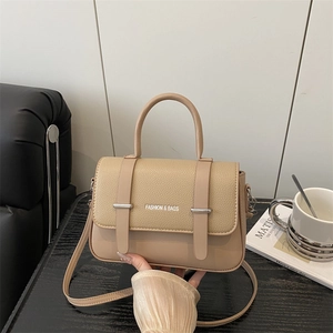 Chic beige textured leather crossbody flap bag with silver hardware for women