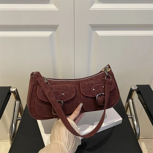Vintage burgundy suede underarm bag with double buckle pockets and silver hardware