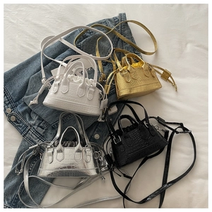 Mini stone pattern crossbody bags in four colors with drawstring interior and round handles
