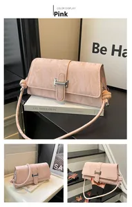 Detailed close-up of pink leather crossbody bag with marble texture and silver clasp